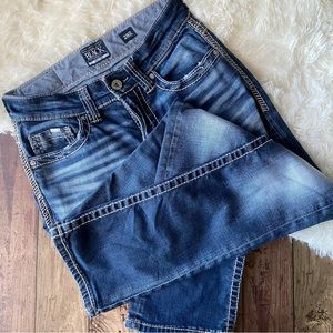 Buckle Black Bootleg Distressed Jeans Fit No. 3 / 28R. Faux Flap back pockets.